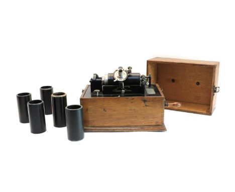 An Edison phonograph Type 2 'Standard' no. S9104, in oak caseCondition report: No horn, winds up and motor runs, case and lid