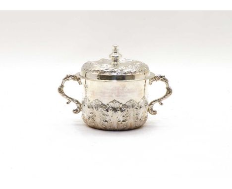 A Charles II style Britannia silver porringer and cover, by Lambert &amp; Co, London 1910, the body decorated with acanthus f