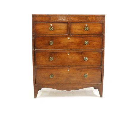 A George IV mahogany tall chest of two short and three long drawers, with simple pressed brass knob handles, on bracket feet,