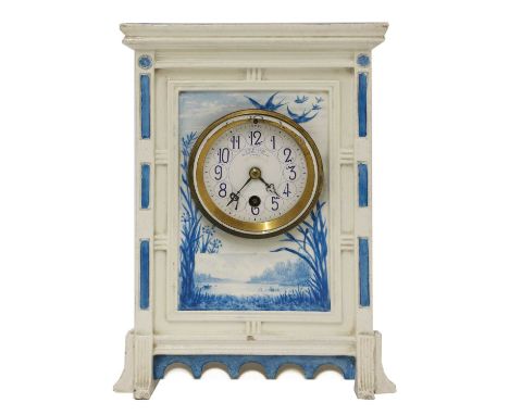 A Wedgwood pottery mantel clock, 1885, the blue and white case painted with river scenes including swans, swallows and irises