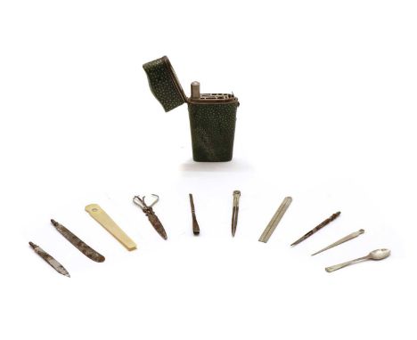 A shagreen etui, early 19th century, with tools including, folding rule, scissors, compass, spoon, tweezers, ivory note card,