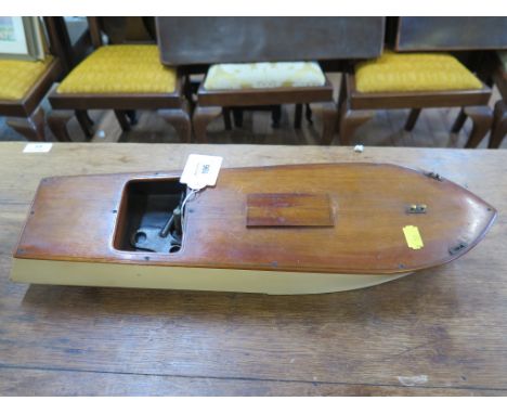 A 1930s clockwork powered model speed boat with brass rudder and propeller 47cm long