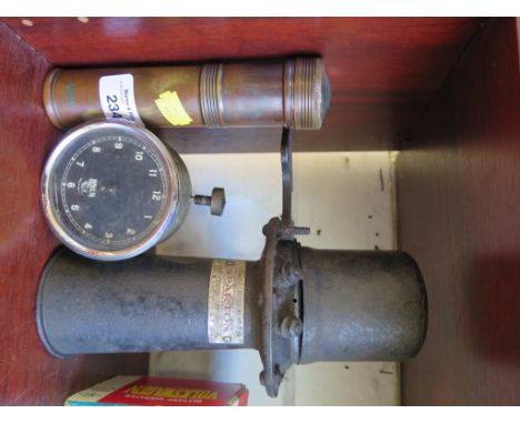 A Sparks Withington Company Sparton electric horn Model P.J., a Smiths car clock and a Kwik'lite torch (3)