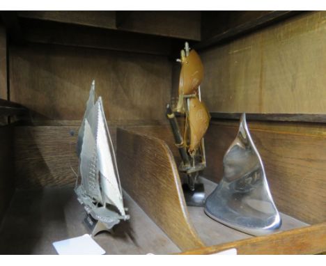 Three model ships comprising Canadian schooner 'Bluenose', a polished aluminium engraved 1/47 abstract model of a sailing shi