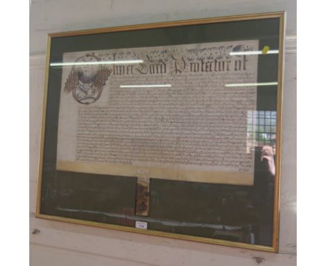 A 17th century vellum legal manuscript dated Feb 1656, framed, lacks seal 42cm x 66cm