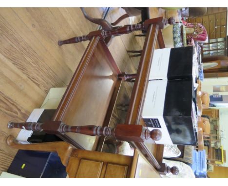 A late Victorian two tier whatnot, the rectangular galleried tiers on ring turned supports 76.5cm wide, 49cm deep, 88cm high
