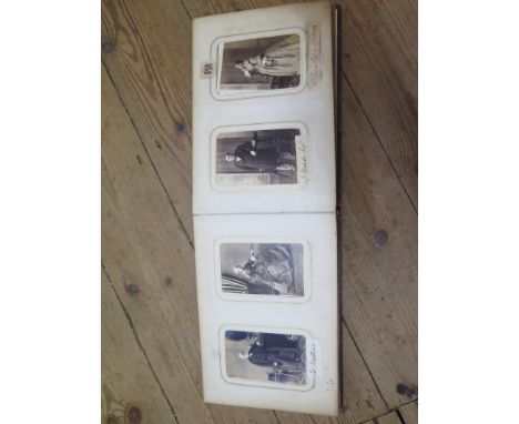 An album of Victorian and Edwardian Carte de Visite portrait photographs, some with hand written names and family seals, 62 p