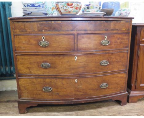 An early Victorian mahogany bowfront chest of drawers, with crossbanded frieze drawer over two short and two long graduated d