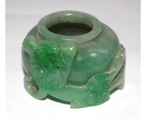 A Chinese jade brush washer with animal carving