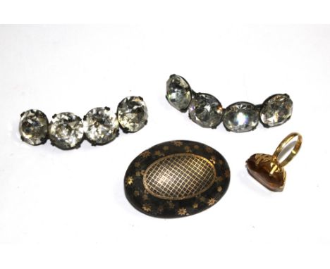 A small collection of jewellery to include a quartz ring, a set tortoiseshell brooch, etc