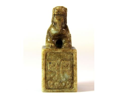 A Chinese jade / hardstone seal mounted with lion, H. 7.4cm.