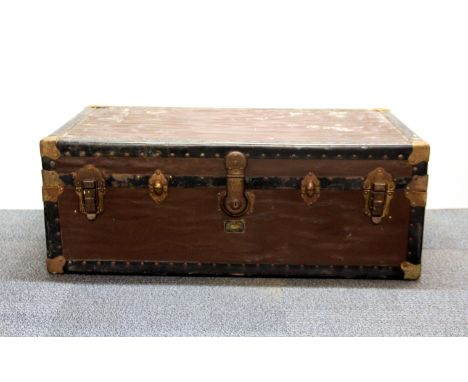 A vintage cabin trunk, with original Harvey Nichols, 92cm x 52cm x 34cm.