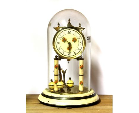 An enamelled four hundred day mantle clock with dome, H. 29cm.