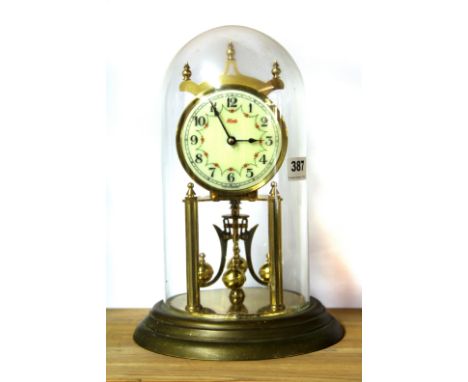 A vintage four hundred day Kundo brass mantle clock with dome, H. 29cm.