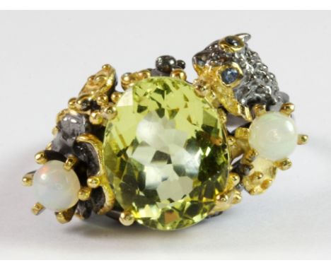 A Hana Maae designer 925 silver gilt ring set with an oval cut lemon citrine, opals and sapphires (R).