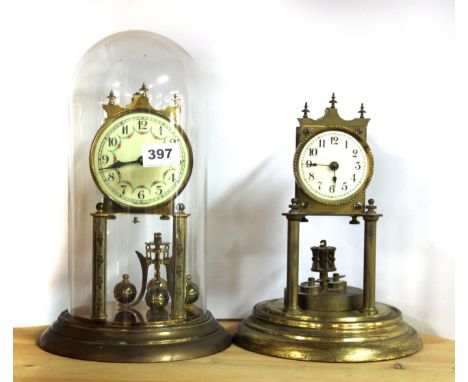 A four hundred day gilt brass mantle clock and dome, together with a further mantle clock without dome.