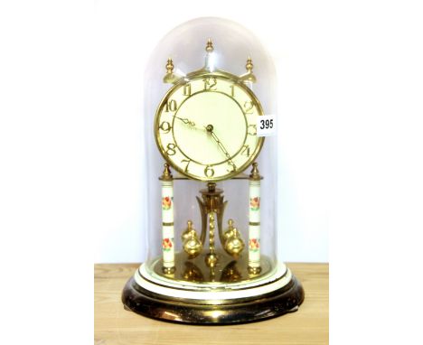 An enamelled brass four hundred day mantle clock, H. 30cm.