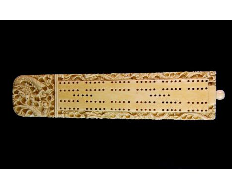 A 19th century Chinese carved ivory cribbage score card, L. 19cm,.