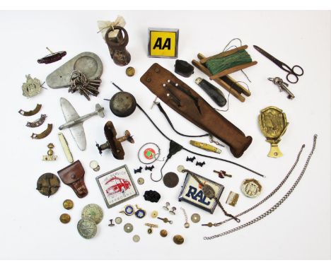 A collection of vintage ephemera to include, an alloy model of a Spitfire, assorted tunic buttons, a collection of clock and 