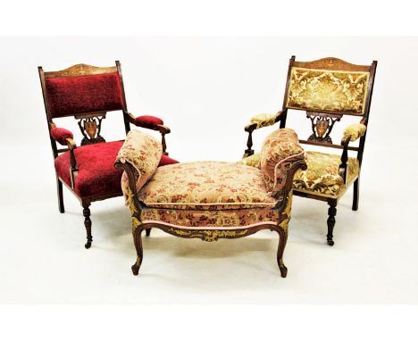 A pair of late Victorian inlaid rosewood parlour chairs, with an open work shield shaped splat, above a spring seat, raised u