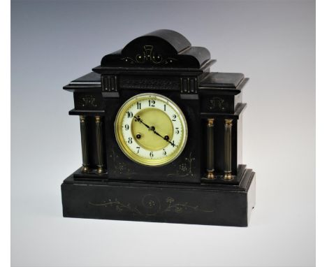 A Victorian slate architectural mantel clock, the 13cm gilt dial with a white enamelled chapter ring, enclosing the two train