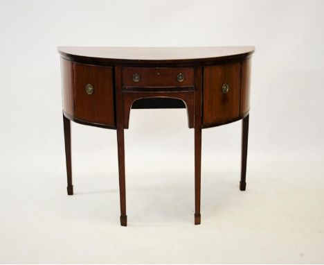 A George III style mahogany bow front sideboard of small proportions, the single convex frieze drawer flanked by a pair of cu