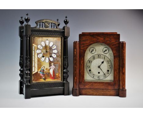 A 1920's German oak cased three train bracket clock, with a 16cm arched silvered dial, subsidiary slow/fast and silent/chime 