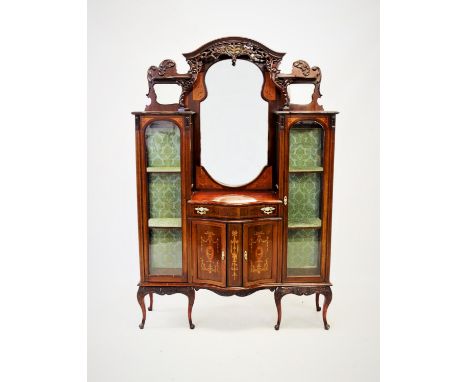 An Edwardian inlaid mahogany mirror back chiffonier, the architectural high back with an arched canopy over a shaped mirror, 