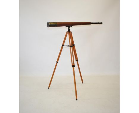 A leather covered telescope by Broadhurst, Clarkson & Co, 63 Farrington Rd, London, the tapering four drawer body stamped wit