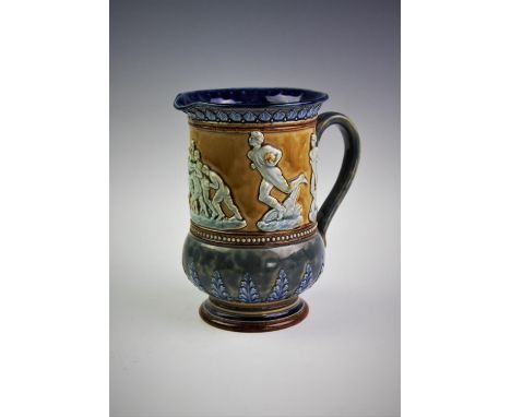 A Doulton Lambeth jug, 19th century, decorated by Emma Marriot and Agnes Sandes, with a central frieze of figures playing rug