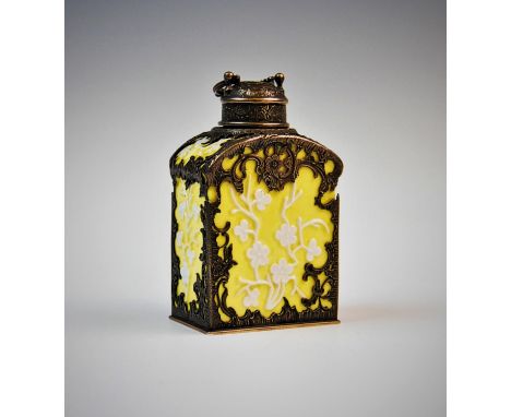A German porcelain tea caddy, with later silver overlay, possibly Meissen circa. 1740, of typical form, decorated with yellow