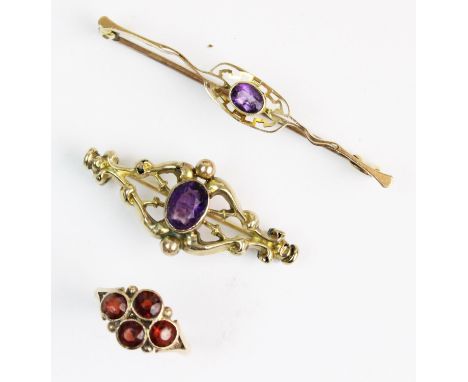 An early 20th century garnet cluster ring, comprising four round old cut garnets each measuring approx. 4mm, collet set to sp