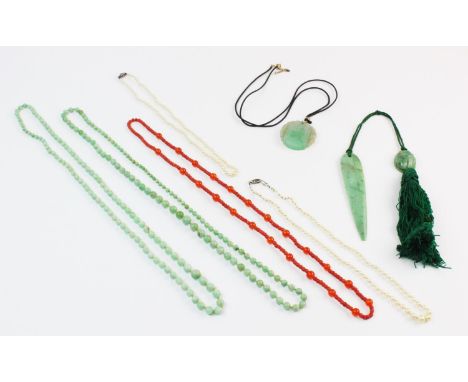 A coral and glass bead necklace, comprising 170 off-round coral beads interspersed with 23 round glass beads, length approx. 