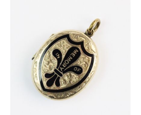A Victorian enamelled memorial locket pendant, the yellow metal oval shaped pendant with black enamel shield design to front 