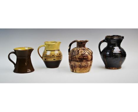 An art pottery jug, Edward Bingham for Castle Hedingham, late 19th century, the jug of wide baluster form, decorated with app