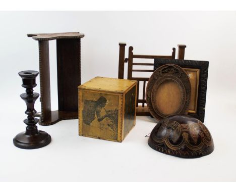 An oak miniature garden gate, the railed gate supported on two square section posts, upon a rectangular base, 28cm high, a ca