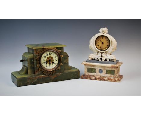 A late 19th century French green onyx mantel clock, of stepped form, with a 10cm ceramic dial, enveloped by a leaf swept ormo