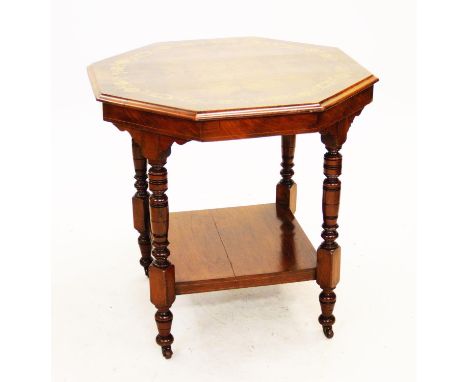 A late Victorian walnut octagonal occasional table, the quarter veneered moulded top inlaid with a trailing ivy border, above