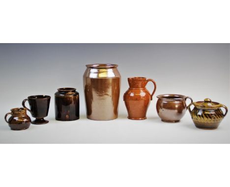 A collection of stoneware and terracotta vessels, 19th century and later, comprising; a terracotta Sarum jug, of baluster for
