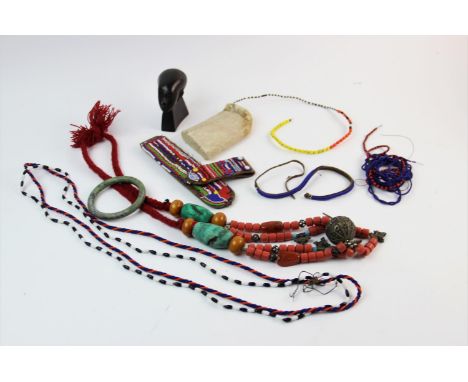 A North African Moroccan Berber necklace with coral coloured beads, various Masai and Zulu bead work, green hardstone bangle 