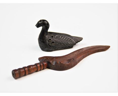 A late 19th century chip carved wooden letter opener, the curvilinear blade incised with the initials 'M W' and the date 1881