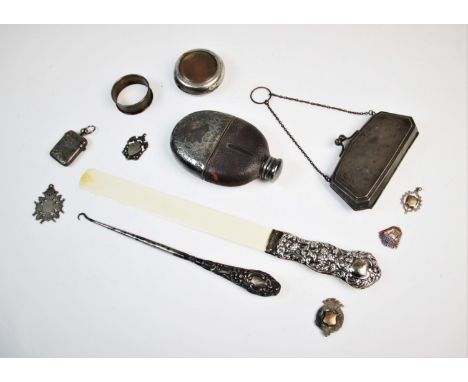 A selection of silver and silver coloured items, to include, a silver mounted ivory page turner, Edmund Bennett, London 1911,