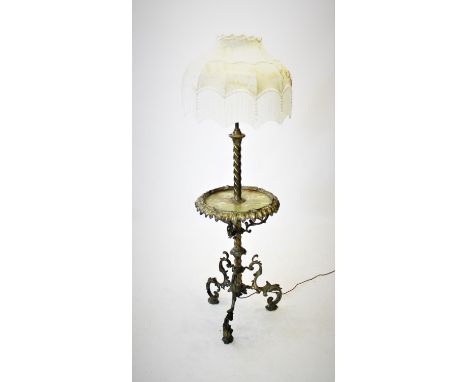 An Edwardian brass and onyx standard lamp table, the telescopic rope twist column supporting a circular onyx table top with a