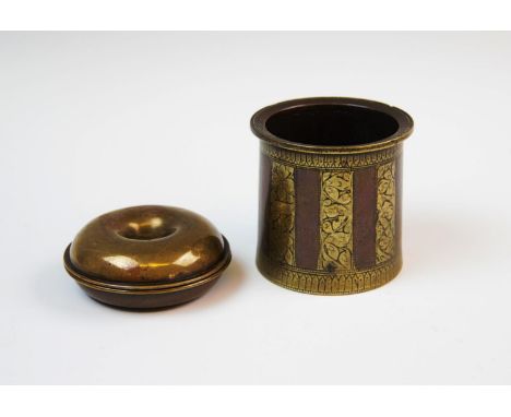 A mid 19th century brass Brighton bun, of typical ring form, threaded to morph into a pair of travel candlesticks, 9cm diamet