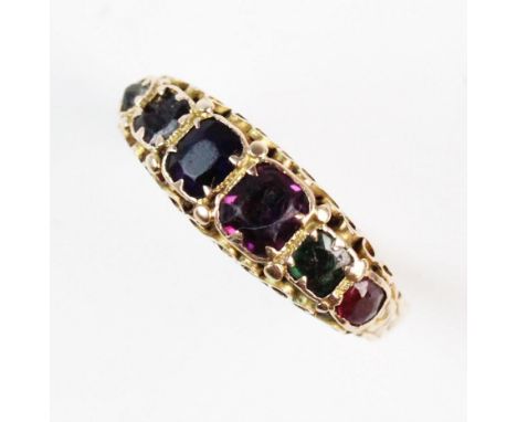 A Victorian 15ct gold regard acrostic ring, comprising seven mixed cut gemstones of graduating size, all claw set in yellow m