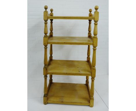 A pine four tier shelf on turned supports,  155 x 75cm 