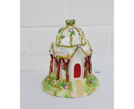A Staffordshire pottery night light, 15cm high 