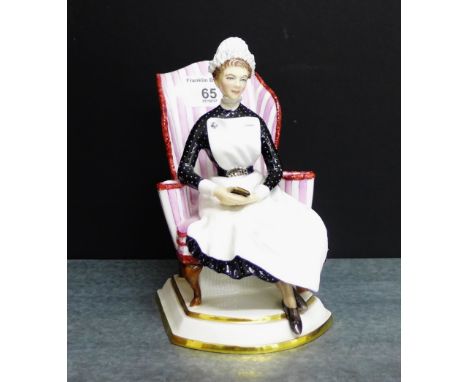 A Royal Worcester bone china figure 'Sister' Nightingale Training School, St. Thomas's Hospital, London, modelled by Ruth Van