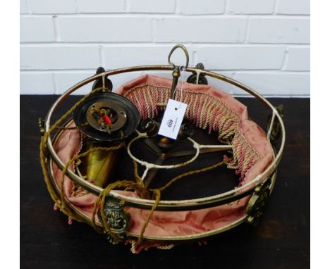 A brass rise and fall ceiling light