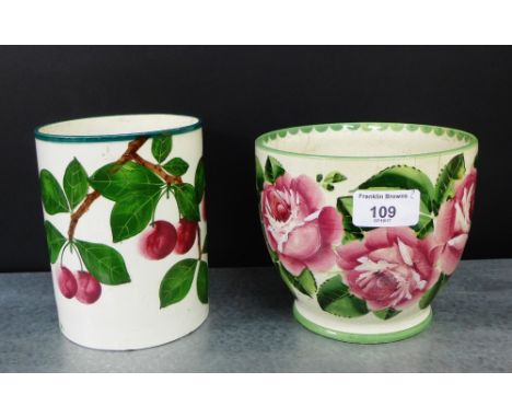 A Wemyss ware mug painted with cherries (handle lacking), together with a Wemyss 'Rose' patterned planter, tallest 14cm, (2) 